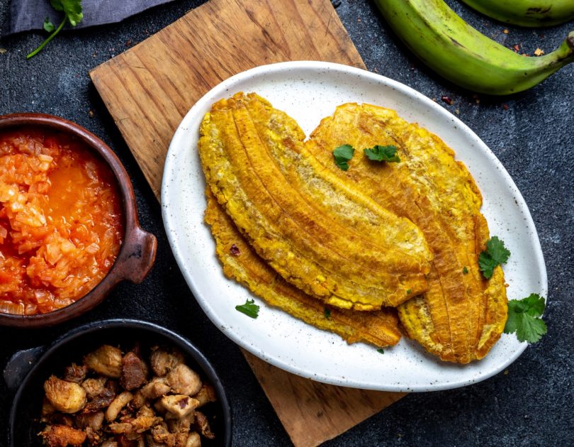 Colombian Caribbean Food. Patacon or Toston, Fried and Flattened Whole Green Plantain Banana